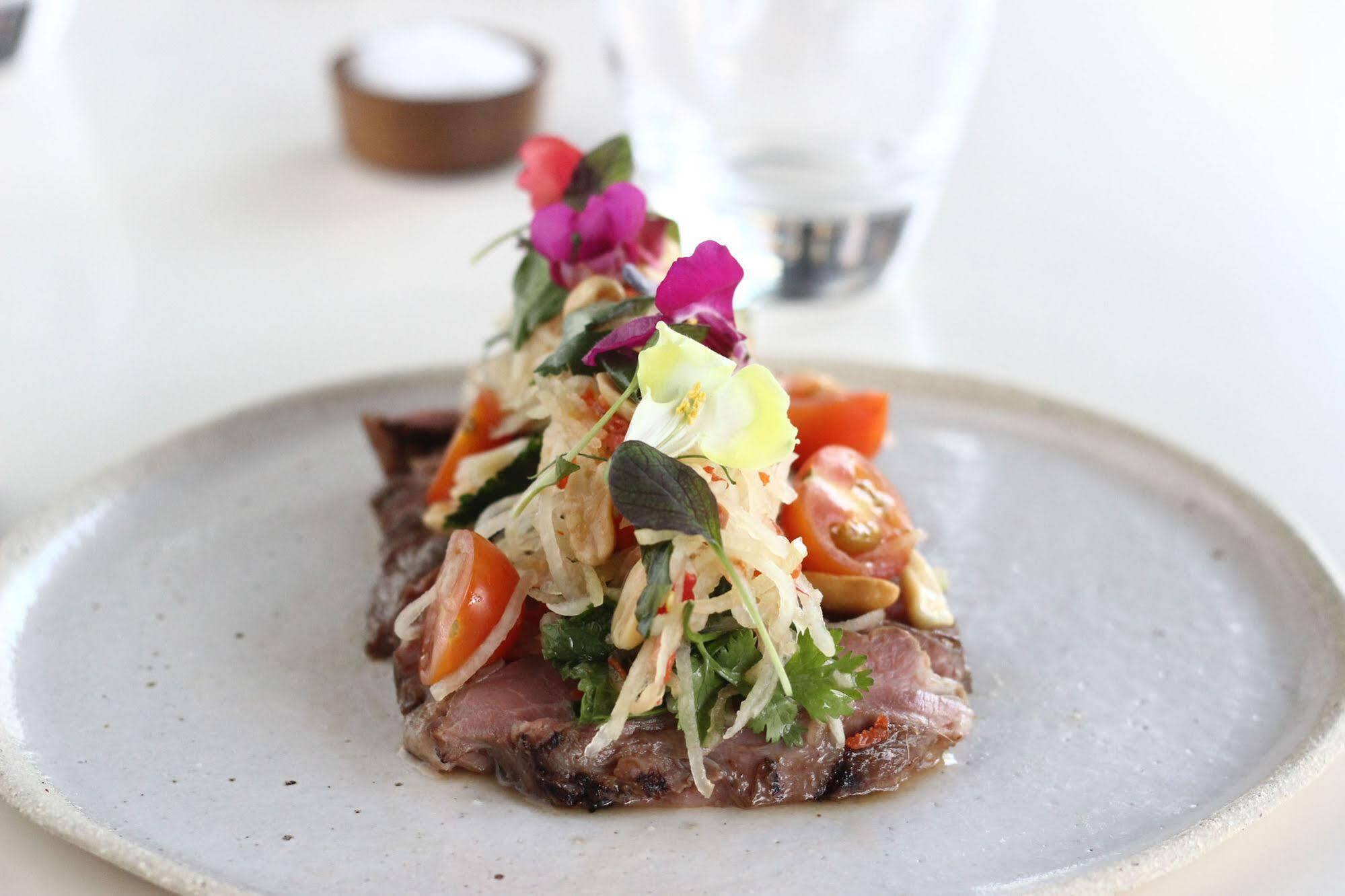 Peppers Docklands Hotel Melbourne Exterior photo A salad with edible flowers